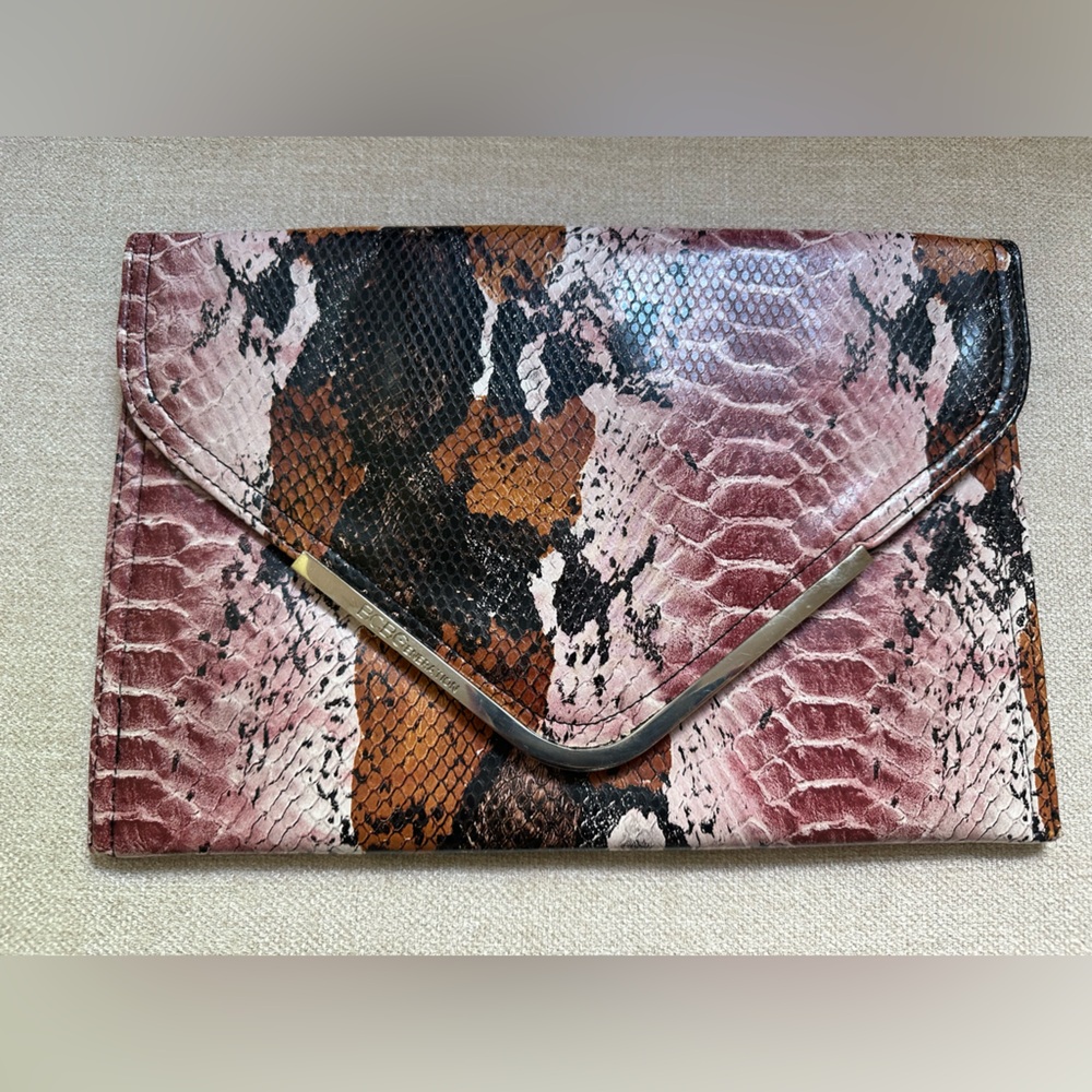 BCBGeneration Black, Pink, Orange Clutch with Snakeskin Pattern